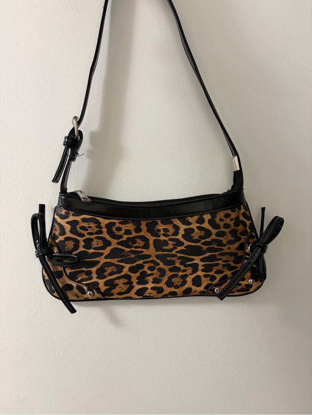 Leopard Print Shoulder Bag with Black Trim and Bow Accents